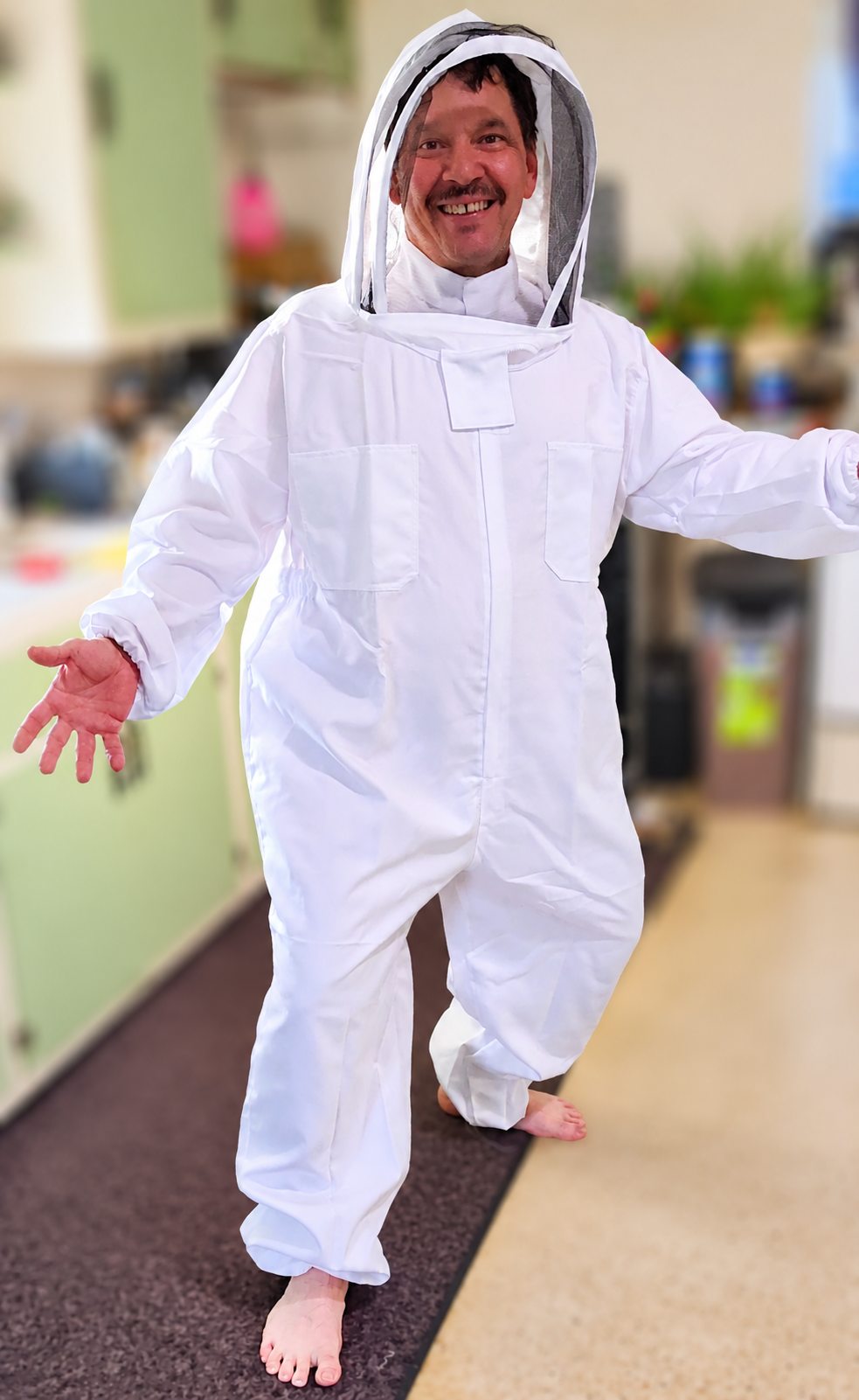 JT HandyMax in a beekeeping suit, ready for safe home services
